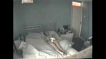 Hidden cam catches my mum masturbating on bed