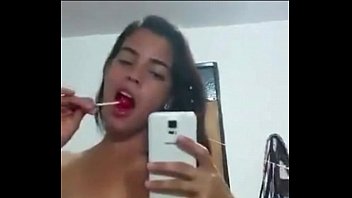Sucking lollipop in the absence of cock