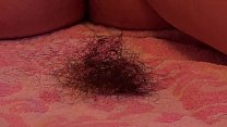 A fat girl shaves her hairy pussy and ass.