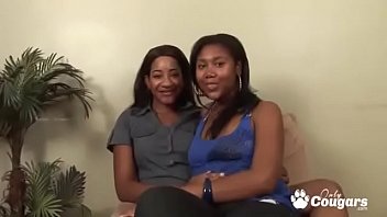 Two Beat Black Chicks Bang with A Strapon