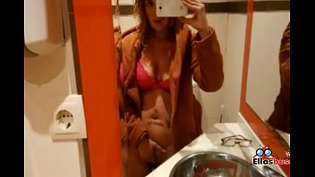 Horny blonde in public bathroom looking for sex
