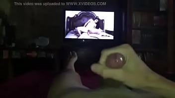 a handjob watching porn