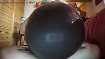 A huge black balloon will be used as if it were a big hard cock!