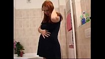 Redhead pregnant in shower
