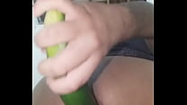 Sticking the cucumber in the ass