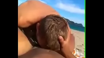 Deep throat on the beach
