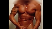 muscled guy jerks off in the shower and cums in his protein shaker before drinking it
