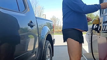 Old man gets gas in short skirt