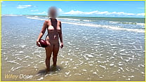 Nude wife at public beach gets splashed with water