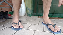 Dangling and shoeplay with female flip flops and sandals
