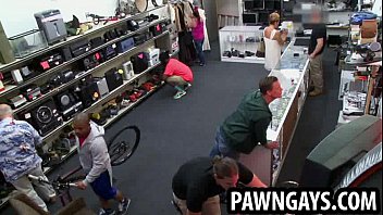 Ebony hunk tries to sell a bike at the pawn shop